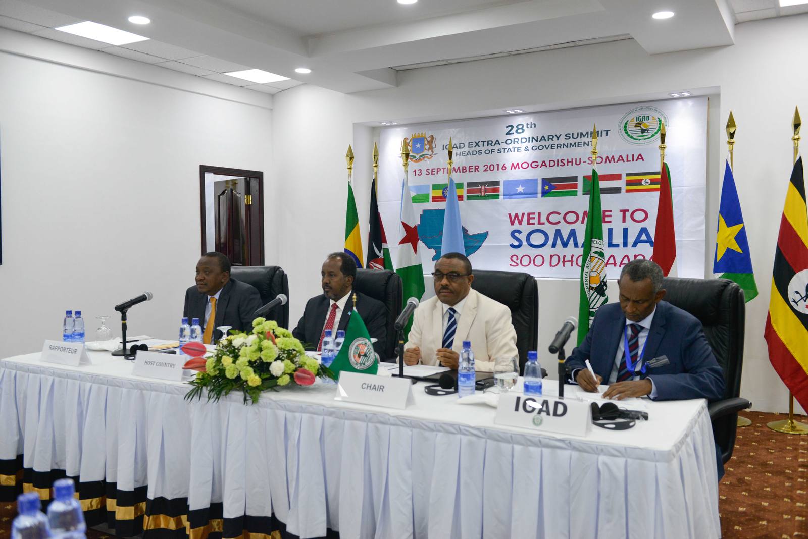 Heads of state and delegates seated at a regional summit on peace and security